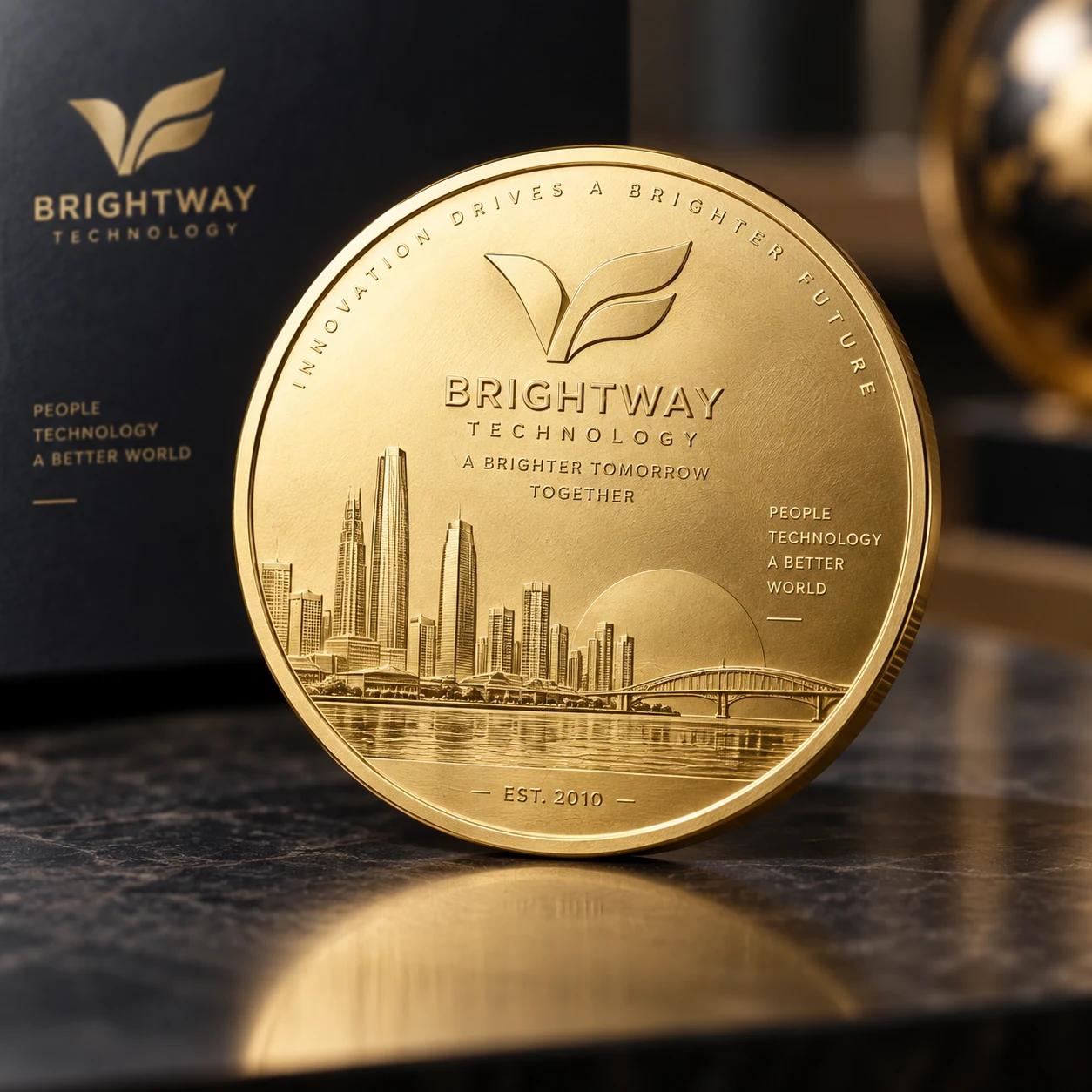 Gold-toned corporate commemorative coin with a skyline relief