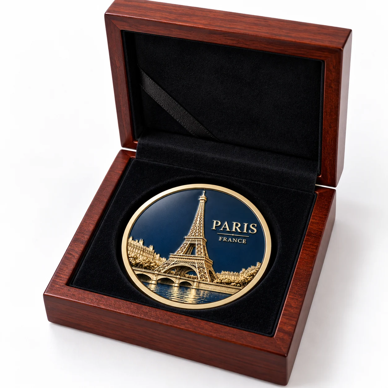 Paris commemorative coin presented in an open wood box with a black insert